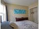 Bedroom featuring a comfortable bed with large dresser, closet, and curtained window at 4938 Terrace Green Trce, Stone Mountain, GA 30088