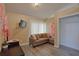 Comfortable living room with wood-look floors, neutral walls, and ample natural light at 4938 Terrace Green Trce, Stone Mountain, GA 30088