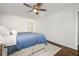 Bedroom featuring hardwood floors, ceiling fan, large closet, and natural light at 2120 Blaylock Dr, Marietta, GA 30062