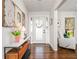 Inviting entryway with hardwood floors, marble top console table, and front door with sidelights at 2120 Blaylock Dr, Marietta, GA 30062