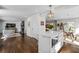 Bright living space with fireplace and open floorplan flows into kitchen and dining area at 2120 Blaylock Dr, Marietta, GA 30062