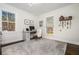 Bright home office featuring large windows with natural light and dark hardwood floors at 2120 Blaylock Dr, Marietta, GA 30062