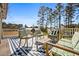 Outdoor patio with stylish seating, an area rug, and a built-in grill at 2120 Blaylock Dr, Marietta, GA 30062