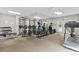 Fitness center featuring free weights, elliptical and treadmill machines, and mirrored wall at 2657 Lenox Rd # F84, Atlanta, GA 30324