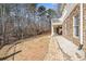 Beautiful backyard featuring an elevated deck and stone accents on the exterior of the home at 332 William Dr, Canton, GA 30114