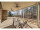 Beautifully lit covered patio with stone accents and views of the backyard at 332 William Dr, Canton, GA 30114