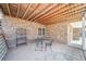 Rear patio with stone accents and open wood beam ceiling at 332 William Falls Dr, Canton, GA 30114