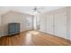 Bedroom featuring a double door closet, a dresser, and hardwood floors at 332 Williamfalls Dr, Canton, GA 30114