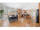 Bright kitchen with hardwood floors, an island with bar seating, and stainless steel appliances at 332 Williamfalls Dr, Canton, GA 30114