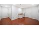 Spacious room with hardwood floors and versatile space, featuring a counter and closet at 332 Williamfalls Dr, Canton, GA 30114