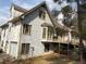 Back exterior view of home with multiple windows and a backyard deck at 4508 Bankside Court, Marietta, GA 30066