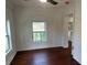 Cozy living room featuring a brick wall and a window overlooking the neighborhood at 684 S Hairston Rd, Stone Mountain, GA 30088