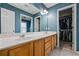 Bathroom with dual sink vanity and walk-in closet providing plenty of space and storage at 4612 Liberty Square Dr, Acworth, GA 30101