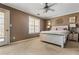 Relaxing bedroom featuring natural light, ceiling fan, and comfortable bed, creating a peaceful retreat at 4612 Liberty Square Dr, Acworth, GA 30101