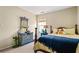 Cozy bedroom with a full size bed, dresser and ample natural lighting at 4612 Liberty Square Dr, Acworth, GA 30101