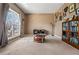 Spacious living room featuring plush carpet, ample natural light, and stylish decor at 4612 Liberty Square Dr, Acworth, GA 30101