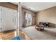 Bright living room with hardwood floors, neutral carpet, and a large window at 4612 Liberty Square Dr, Acworth, GA 30101