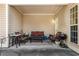 Cozy patio with comfortable seating and a grill at 4612 Liberty Square Dr, Acworth, GA 30101