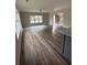 Bright and airy living room boasting hardwood floors and a clear view of the staircase and entrance at 4755 Fowler St, Acworth, GA 30101