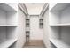 Organized closet with custom shelving and ample storage space at 5305 Pilgrim Point Rd, Cumming, GA 30041