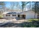 Inviting ranch-style home featuring a convenient carport and classic design elements at 5305 Pilgrim Point Rd, Cumming, GA 30041