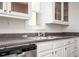 Bright kitchen with stainless steel dishwasher, double sinks, and granite countertops at 5305 Pilgrim Point Rd, Cumming, GA 30041
