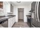 Efficient kitchen layout with stainless steel appliances and ample counter space at 5305 Pilgrim Point Rd, Cumming, GA 30041