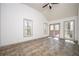 Bright living room with vaulted ceilings, neutral walls, and a door that leads to the back deck at 5305 Pilgrim Point Rd, Cumming, GA 30041