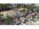 An aerial view of a landscaped residential neighborhood with beautiful houses and a well-maintained golf course nearby at 78 Cuthbert Ln Ne, Acworth, GA 30101