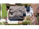 Birds eye view of the backyard featuring a pool, patio, outdoor kitchen, and landscaped walkway and garden at 78 Cuthbert Ln Ne, Acworth, GA 30101
