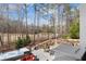 The backyard has a spa, stone patio with outdoor seating, professional landscaping, and access to a golf course at 78 Cuthbert Ln Ne, Acworth, GA 30101