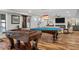 Finished basement featuring a pool table, foosball table, hardwood floors, and recessed lighting at 78 Cuthbert Ln Ne, Acworth, GA 30101