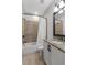 Elegant bathroom with tiled shower and tub combo, vanity and granite countertop at 78 Cuthbert Ln Ne, Acworth, GA 30101