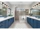 Luxurious bathroom with double vanity, granite countertops, and walk-in tiled shower at 78 Cuthbert Ln Ne, Acworth, GA 30101