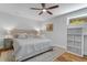 Cozy bedroom featuring a plush bed, soft lighting, and a stylish storage unit for organization at 78 Cuthbert Ln Ne, Acworth, GA 30101