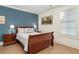 Inviting bedroom showcasing wood floors, a sleigh bed, and ample natural light at 78 Cuthbert Ln Ne, Acworth, GA 30101