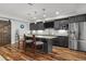 Basement kitchenette with sleek appliances, a breakfast bar, and custom cabinets for seamless entertaining at 78 Cuthbert Ln Ne, Acworth, GA 30101