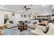 Cozy living room featuring a comfortable sofa, pool table in the background, and hardwood floors at 78 Cuthbert Ln Ne, Acworth, GA 30101
