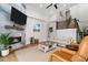 Open living room with a fireplace and comfortable seating, perfect for relaxation and entertaining at 78 Cuthbert Ln Ne, Acworth, GA 30101