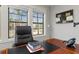 Bright and airy office detail with a view from large windows and a classic desk at 78 Cuthbert Ln Ne, Acworth, GA 30101