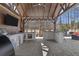 Outdoor kitchen features a grill, sink, stainless steel drawers, a TV, and an outdoor bar at 78 Cuthbert Ln Ne, Acworth, GA 30101
