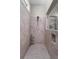 Elegant tile walk-in shower features a showerhead, soap niche, and glass partition at 78 Cuthbert Ln Ne, Acworth, GA 30101