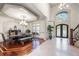 Spacious dining room features elegant millwork, trim, and finishes, creating an inviting space for Gathering gatherings and entertaining at 4233 Sandstone Shores Dr, Stonecrest, GA 30038