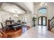 Beautiful dining area with a large table, detailed ceiling, and natural light at 4233 Sandstone Shores Dr, Stonecrest, GA 30038