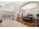 Dining area with decorative wood floors, beautiful wrought iron railing, columns, and detailed ceilings at 4233 Sandstone Shores Dr, Stonecrest, GA 30038