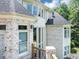 A lovely white brick house with large windows, perfect for natural light at 4233 Sandstone Shores Dr, Stonecrest, GA 30038