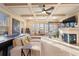 Spacious game room with coffered ceiling, fireplace, pool table, and ample natural light at 4233 Sandstone Shores Dr, Stonecrest, GA 30038
