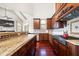 Kitchen featuring granite countertops, stainless steel appliances, and custom cabinetry at 4233 Sandstone Shores Dr, Stonecrest, GA 30038