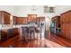 Spacious kitchen with granite counters, stainless steel appliances, and bar seating at 4233 Sandstone Shores Dr, Stonecrest, GA 30038