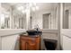 Stylish powder room with a vessel sink, custom vanity, and modern fixtures at 4233 Sandstone Shores Dr, Stonecrest, GA 30038